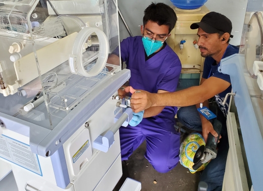 EWH Volunteers, Now a part of the community health program at EWB-USA work to repair medical equipment during a summer institute